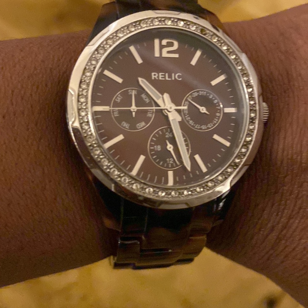 Relic Tortoise shell watch w/ bezel face.